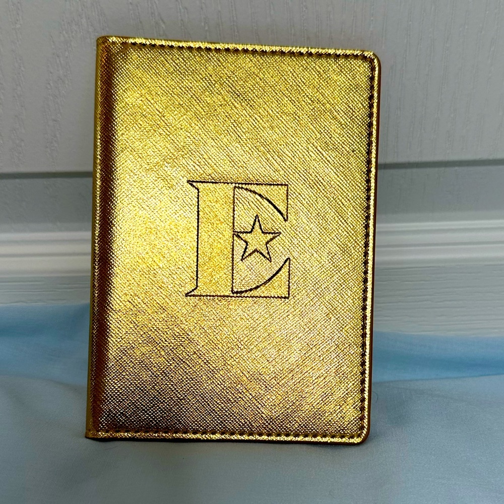 NWOT Passport cover, Elton John branded.
